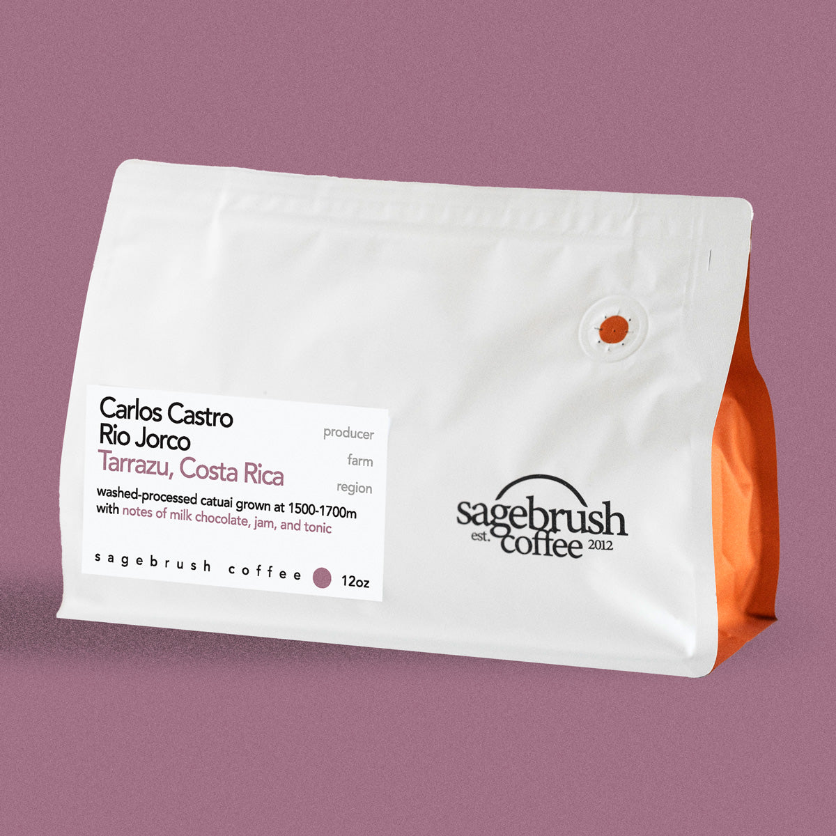 Sagebrush Coffee package of Carlos Castro specialty coffee beans with a purple background