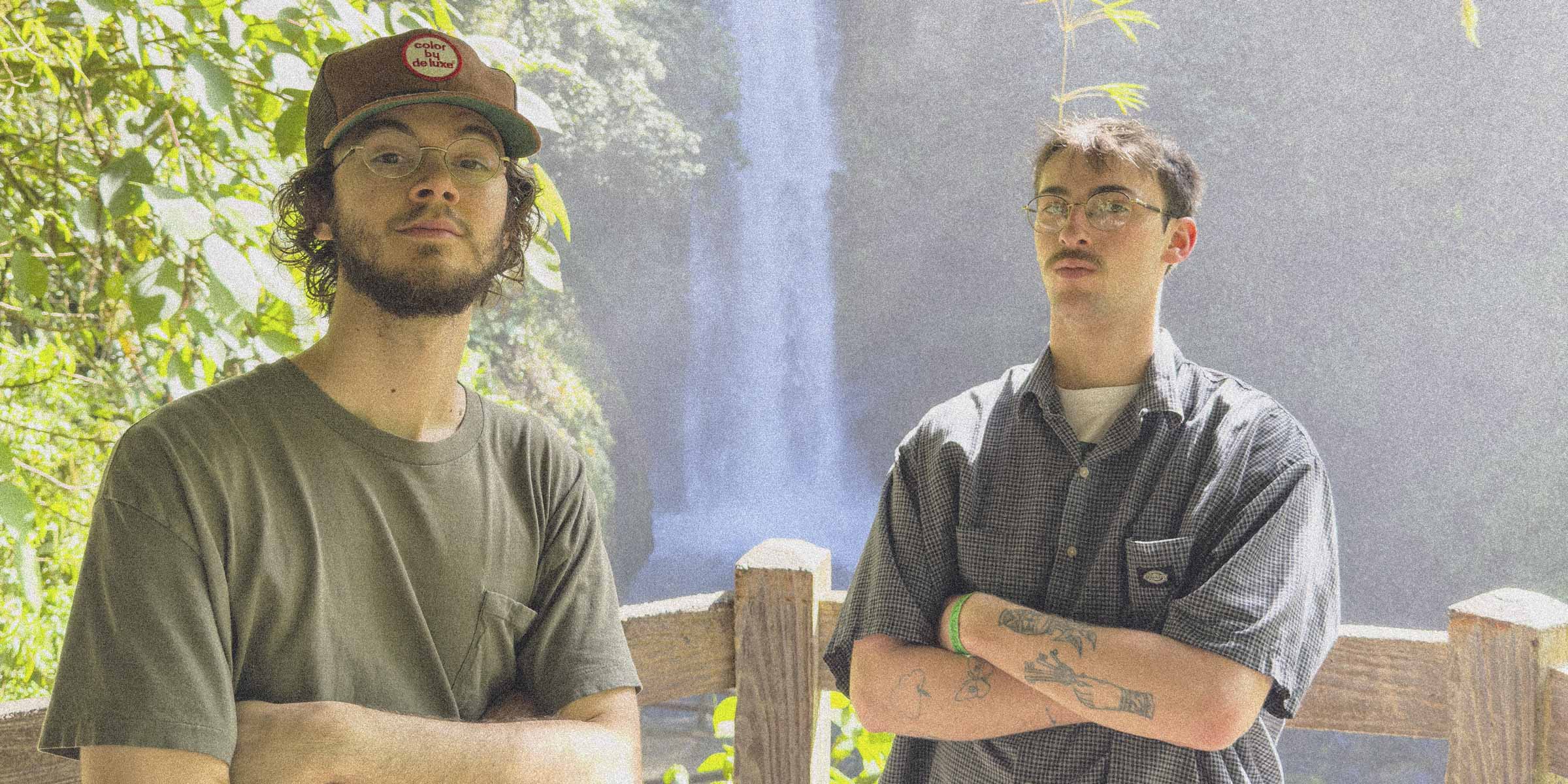 Jonathan and Grant in Costa Rica with a waterfall in the background