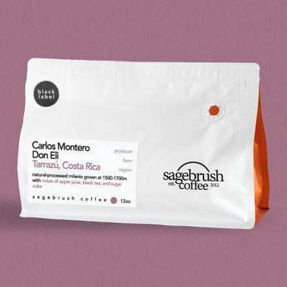 Sagebrush Coffee package of Carlos Montero specialty coffee beans with a purple background
