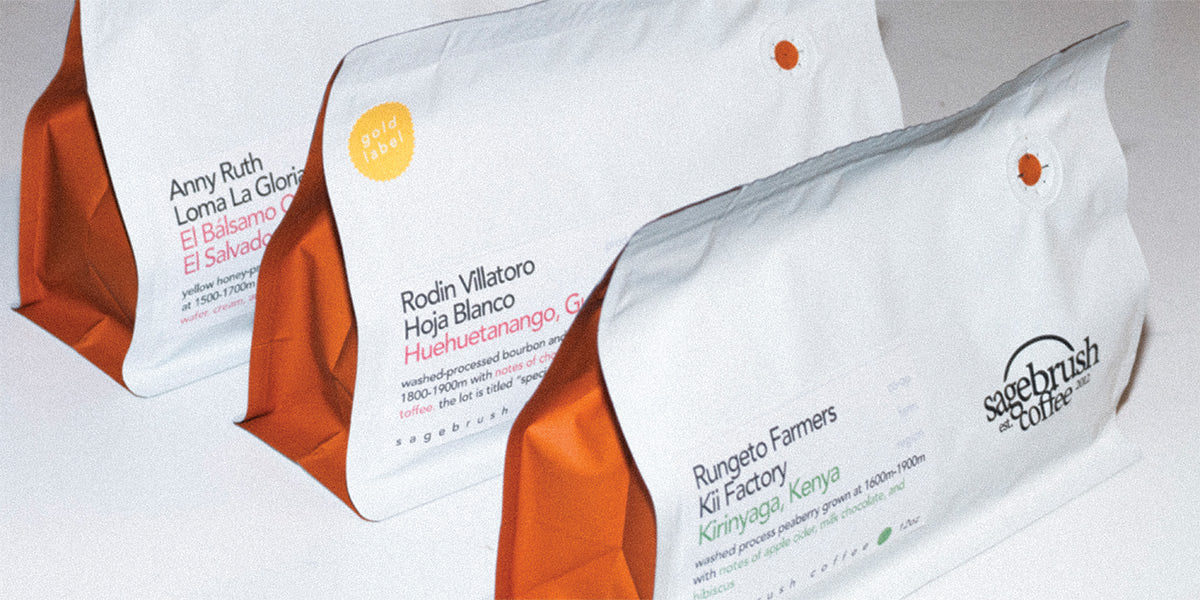 Three white specialty coffee bags 